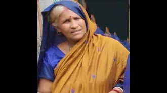 A crocodile pulls a woman into the Brahmani river.