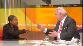 TV host Eamonn Holmes tells guest on GB News to stop lecturing him during intense discussion about Union Jack.
