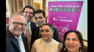 Rani Mukerji unveils stamp honoring Yash Chopra at Australia's Parliament House.