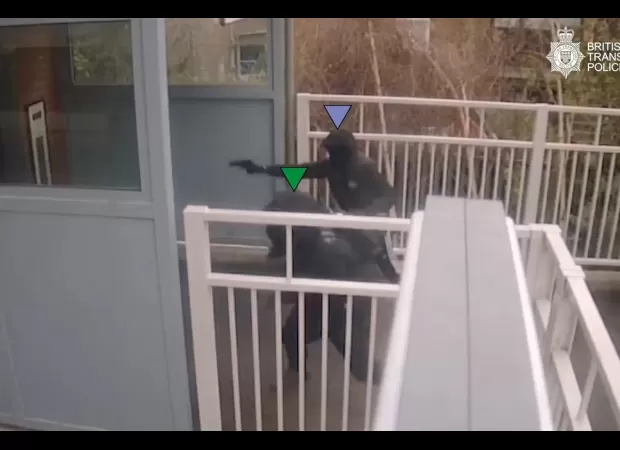 Chaos erupts at London station as gang brandishes firearms in violent confrontation.