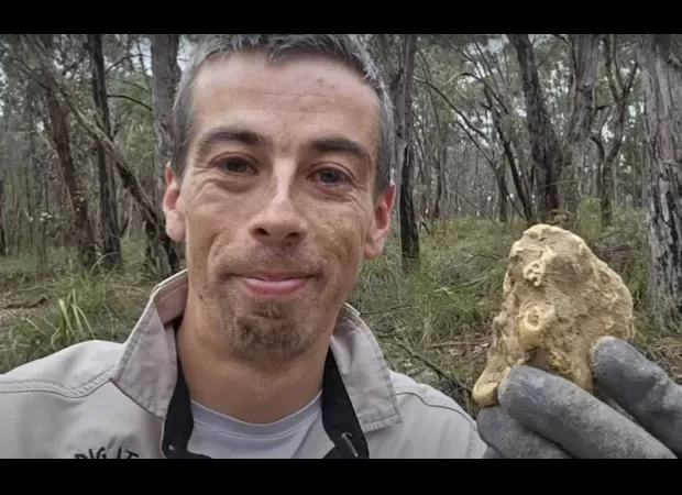 Man discovers valuable gold nugget near old mine, worth around $100k.