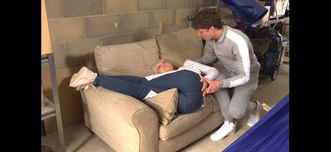 Famous EastEnders star holds her back in pain after being hit by falling sofa.