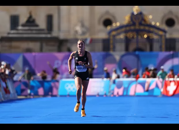 British Olympic athlete finished marathon with fractured leg, tough downhill sections caused extreme pain.
