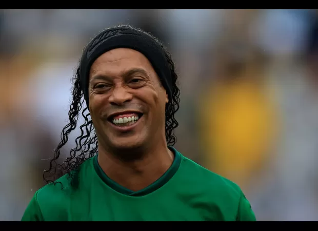 Barcelona's Ronaldinho's son joins Championship team after leaving the club.