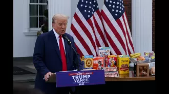 Trump accuses Harris as he stands next to sweet morning meals.