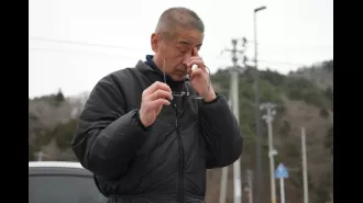 A man continues to dive in search of his wife's body lost in the 2011 tsunami.