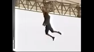 In a daring move, a 90s rock legend climbed onto stage scaffolding in front of 70,000 fans, risking his life.