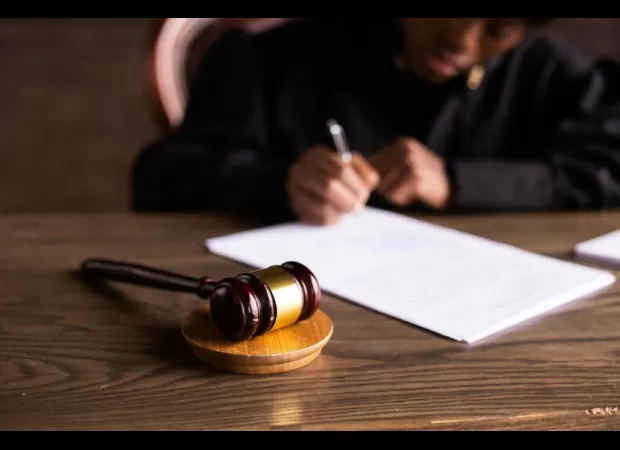 Judge who sent teen to jail for sleeping during school trip has been removed from the bench in Detroit.