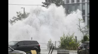 A pipe burst causes a 'geyser' of water.