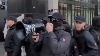 Possible paraphrase: Neo-Nazis suspected of attacking refugee rally in Melbourne.