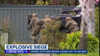 Police have arrested a man after a tense stand-off that ended dramatically.