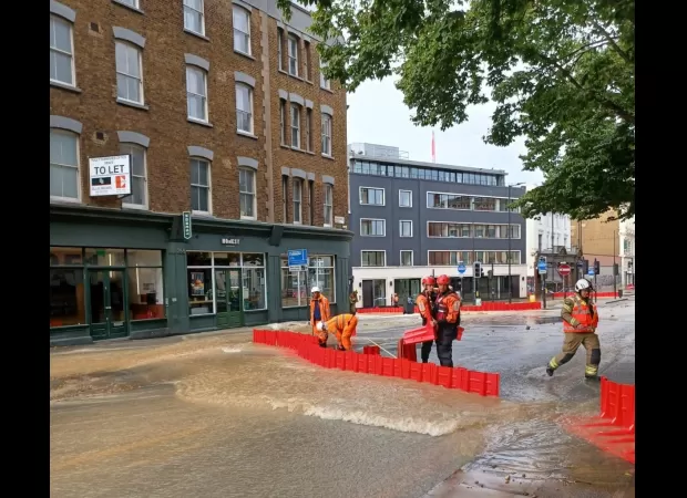 Water main break floods roads around King’s Cross station, causing street closures.