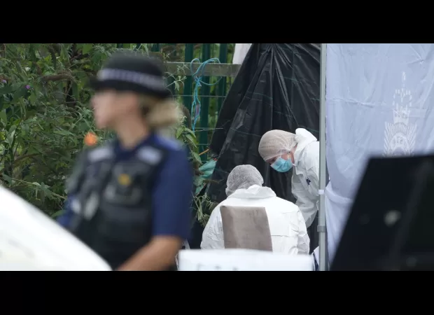 A young woman was fatally stabbed in a fight with a man near a train station.