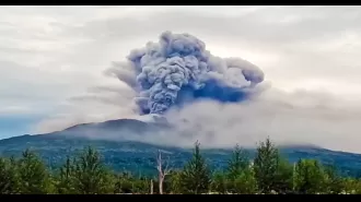 A powerful earthquake causes a volcano to erupt, leading to a 'code-red' warning for aircraft.