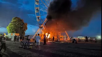 A fire breaks out on a Ferris wheel during a music festival in Germany.