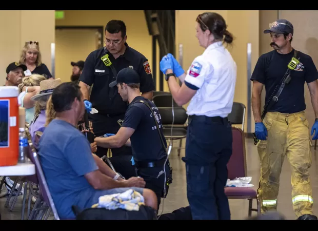 At a Colorado airshow, approximately 100 individuals became ill and 10 were hospitalized due to high temperatures, according to officials.