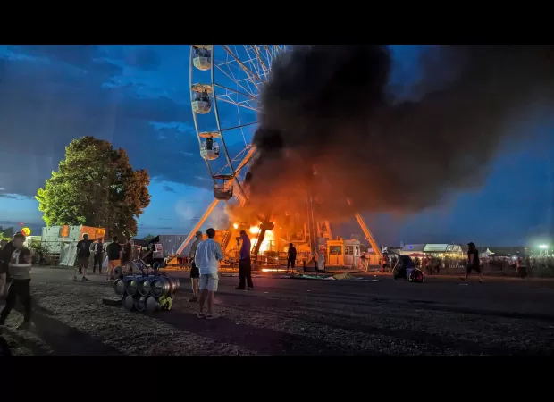 A fire breaks out on a Ferris wheel during a music festival in Germany.