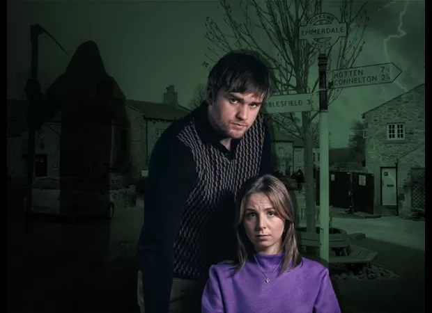 Belle is shocked and resists when the villainous Tom murders a loved one on Emmerdale.