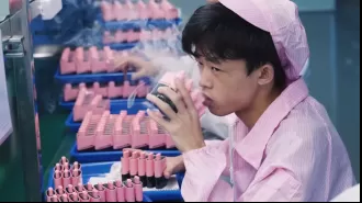 Worker in factory tests thousands of vapes daily on camera.