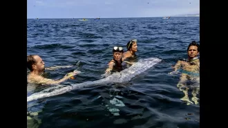 Snorkelers and kayakers discovered a dead 'Doomsday fish' in the ocean.