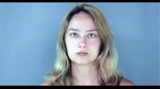 Woman attempts to hit boyfriend while heading to therapy to end relationship.