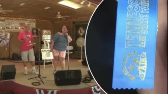 A US fair's 'husband-calling' contest is examined, with contestants giving their all to win.