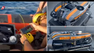 Rescuers use underwater robots to find sunken yacht.