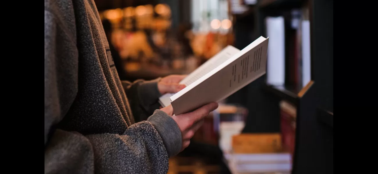 A thief pauses from stealing to read a book.