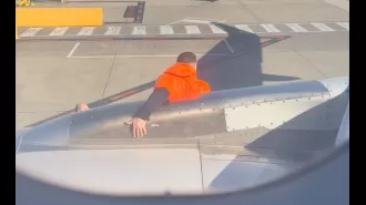 A passenger was taken into custody for opening the emergency exit during a Jetstar flight.
