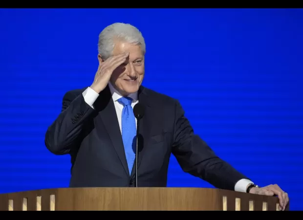 Former US President Clinton bashes Trump at DNC.