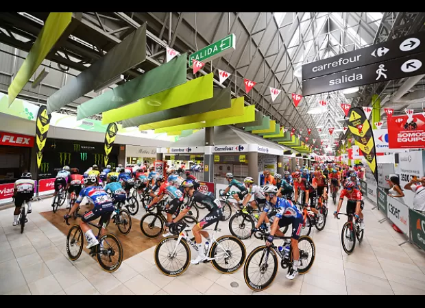 Spanish cycling race begins from inside a supermarket, a unique and unexpected start for the event.