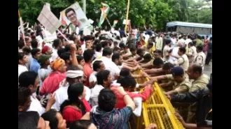 Congress members demonstrate outside the ED office in Odisha to protest against the agency's actions.