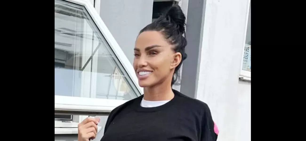 Katie Price proudly displays her fully healed and expensive new face with a big smile.