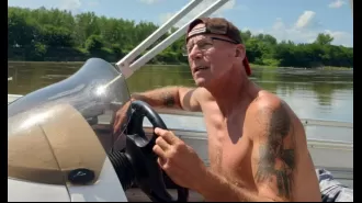 An elderly man heroically sacrifices his life to rescue his girlfriend's son from drowning in a lake.