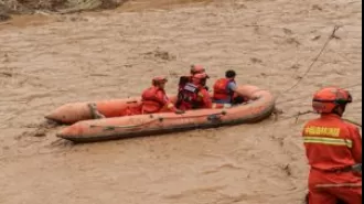 Extreme rainfall in China leaves death toll at 11 and 14 people still unaccounted for.