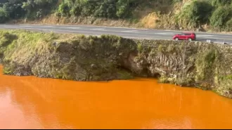Abandoned mine shaft blamed for New Zealand river turning orange.