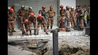 A woman fell into a deep hole in Malaysia when the pavement collapsed.