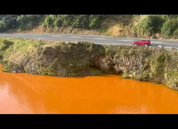 Abandoned mine shaft blamed for New Zealand river turning orange.
