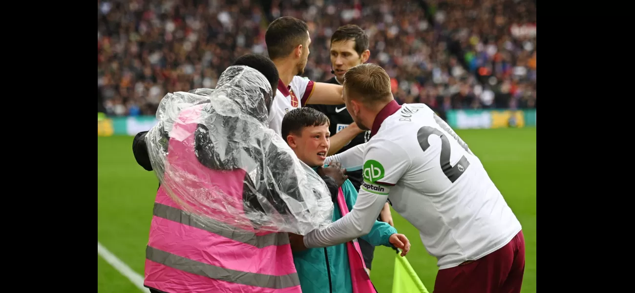West Ham players save ball boy after supporters fall from stands while cheering.