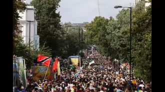 The streets of London are filled with bright hues as a million people gather for the Notting Hill Carnival.