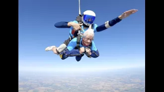 A 102-year-old woman in Britain sets a record for being the oldest person to skydive.