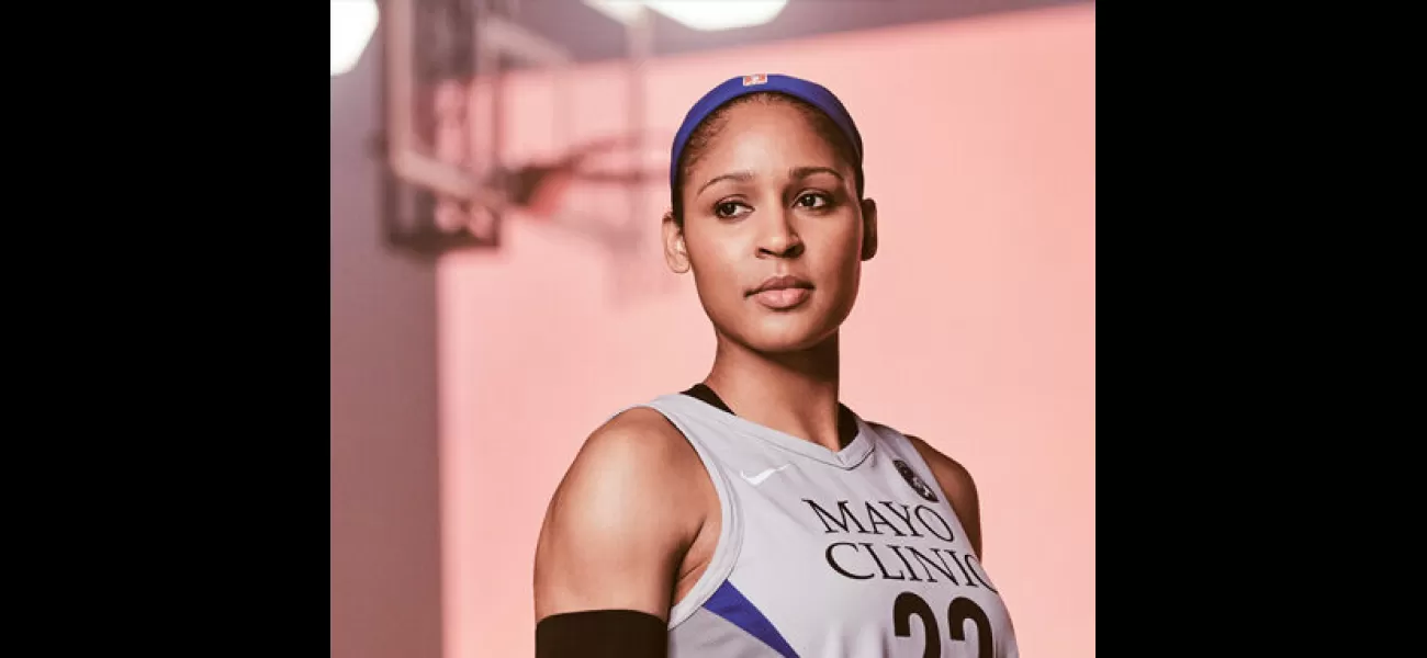 WNBA player Maya Moore honored for her athletic achievements and activism as her jersey is retired in a touching ceremony.