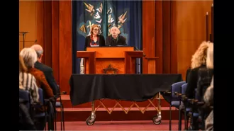 Hundreds gather to bid emotional farewell to beloved sports journalist during moving service.