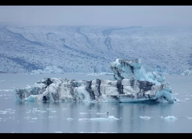 Tragedy strikes as ice cave crumbles, killing one and leaving two others missing among group of tourists.
