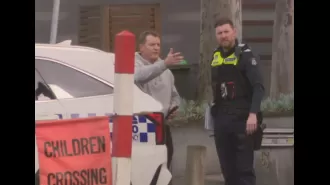 Melbourne AFL coach makes citizen's arrest after stolen car crashes in city.
