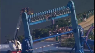 People stuck in the air due to ride malfunction.