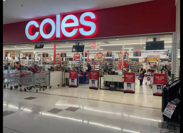 Coles reports $1.1bn profit amidst increasing grocery prices in Australia.