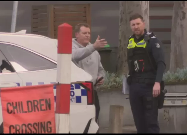 Melbourne AFL coach makes citizen's arrest after stolen car crashes in city.