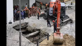 A woman disappeared after falling into a 26ft sinkhole and is still unaccounted for after four days.