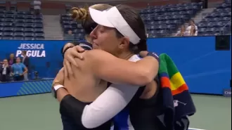 Tennis player breaks down in tears during interview after defeating opponent and causing their retirement.